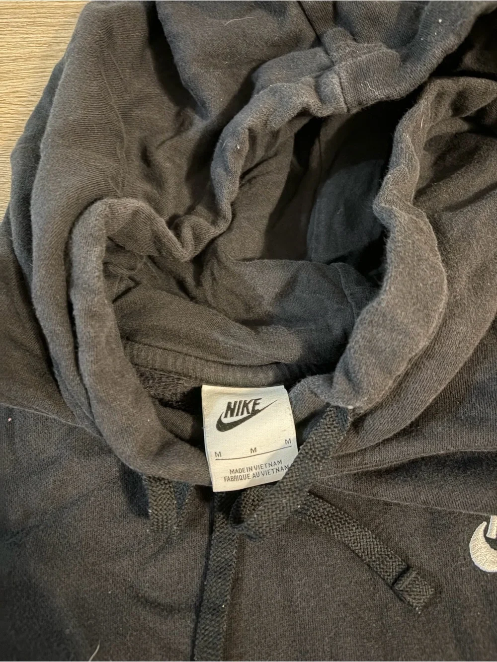 Nike Black Hoodie with White Swoosh Logo